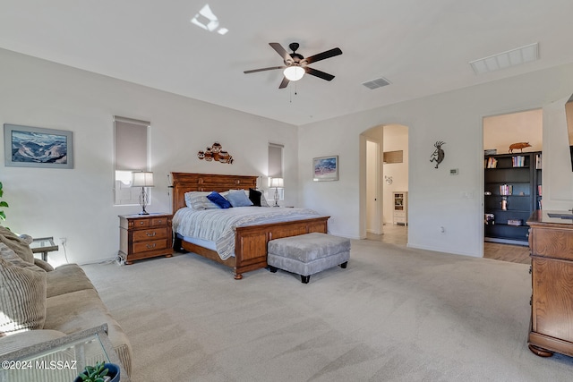 carpeted bedroom featuring ceiling fan