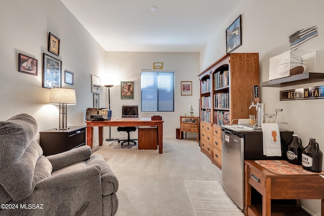 office area featuring light colored carpet