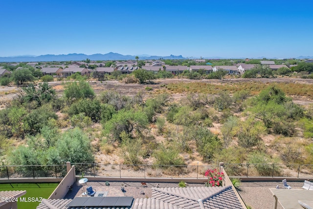 birds eye view of property featuring a mountain view