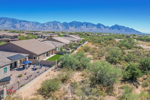 birds eye view of property featuring a mountain view