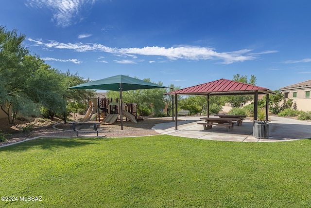 view of play area featuring a lawn and a gazebo