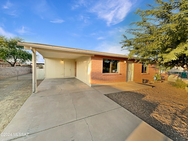 view of front of house featuring a carport