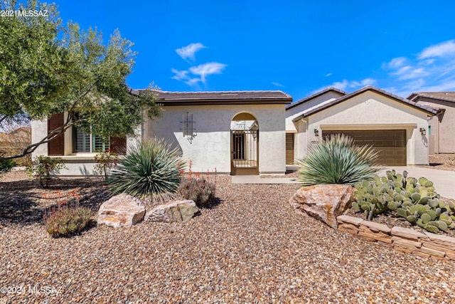 view of front of home with a garage