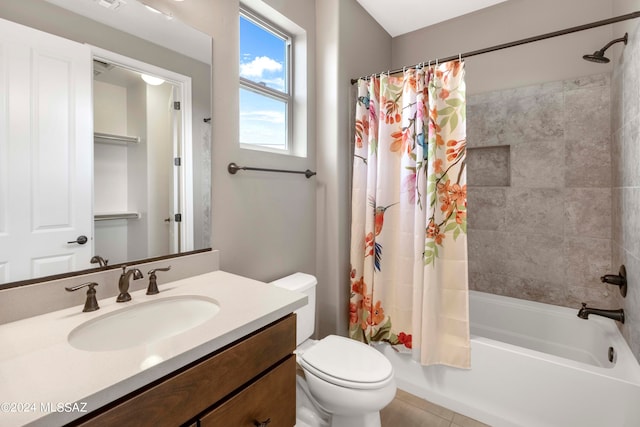 full bathroom featuring shower / tub combo with curtain, tile patterned flooring, vanity, and toilet