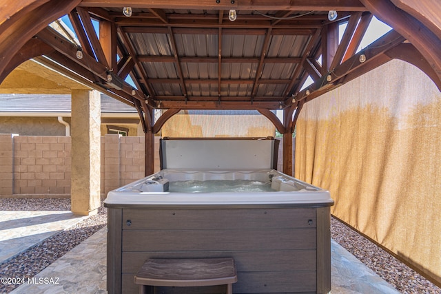 view of patio / terrace featuring a hot tub