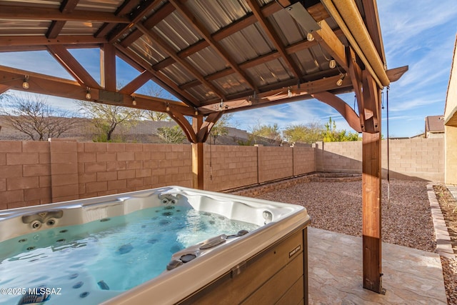 view of patio featuring a hot tub