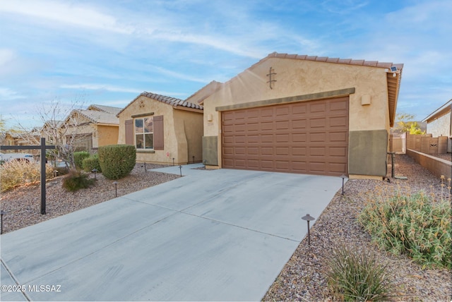 view of front of home with a garage