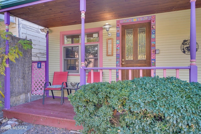 entrance to property with covered porch