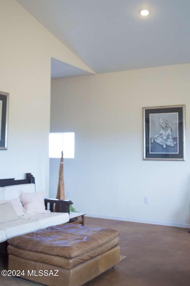 bedroom with lofted ceiling and carpet