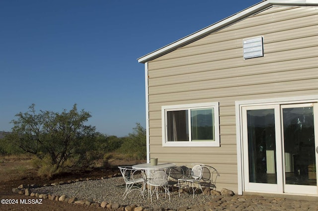 back of house featuring a patio