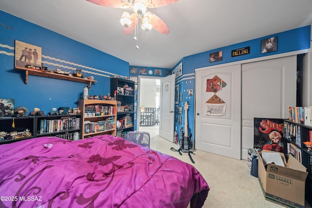 bedroom with a closet and a ceiling fan