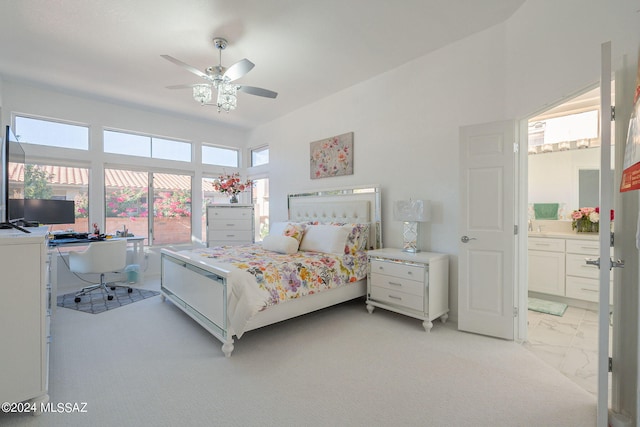 bedroom with light carpet, multiple windows, and ceiling fan