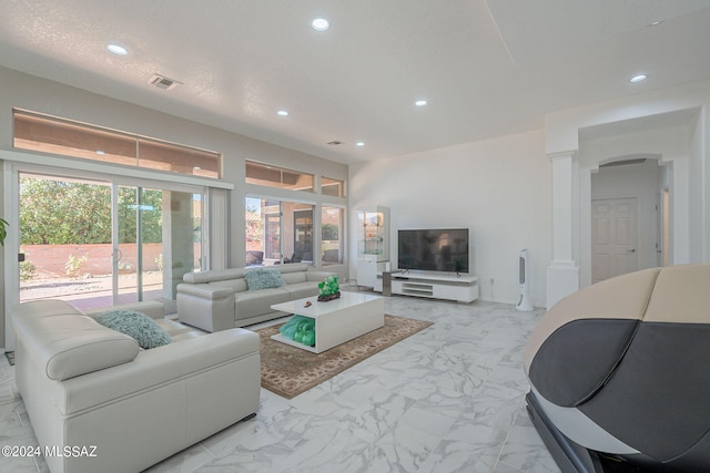 living room with a textured ceiling