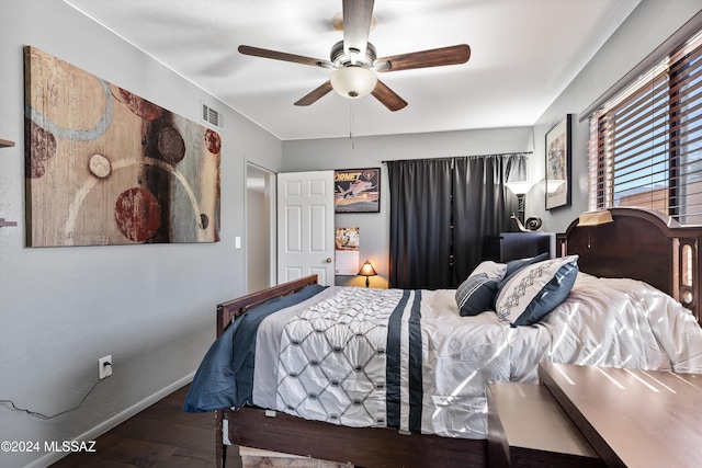 bedroom with hardwood / wood-style flooring and ceiling fan