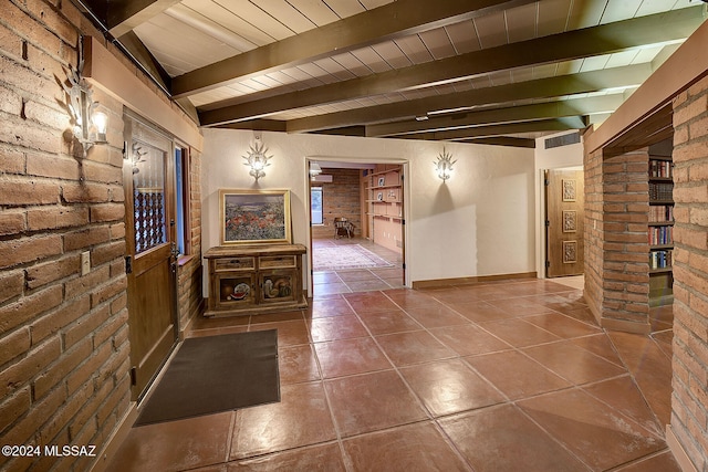 hallway with beamed ceiling, wood ceiling, brick wall, and tile patterned flooring