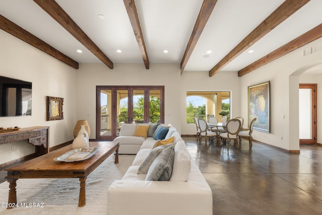 living room with beamed ceiling