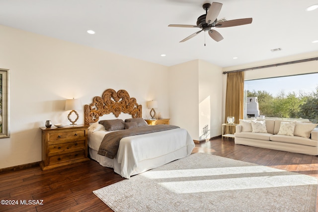 bedroom featuring dark wood-type flooring and ceiling fan