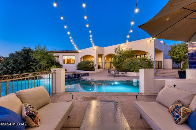 view of swimming pool with a patio area and an outdoor hangout area