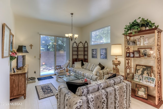 tiled living room with a chandelier