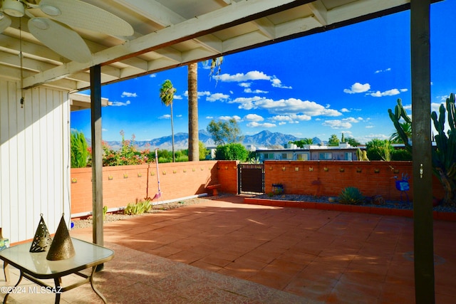 view of patio / terrace with a mountain view