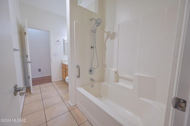 full bathroom featuring toilet, tile patterned flooring, shower / tub combination, and vanity