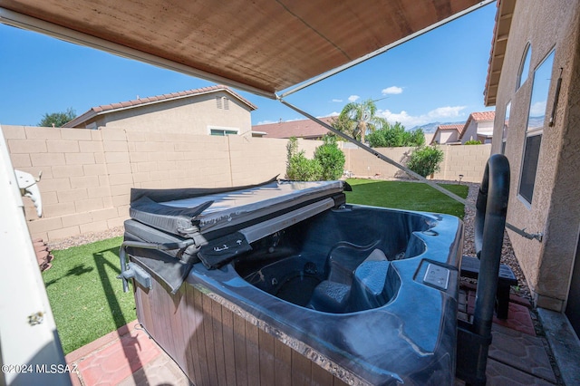 view of patio featuring a hot tub