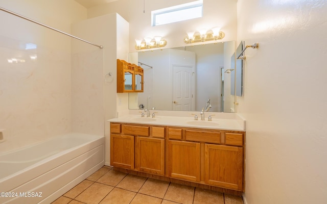 bathroom featuring vanity, bathtub / shower combination, and tile patterned floors