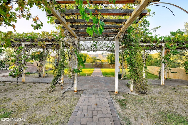 view of patio featuring a pergola