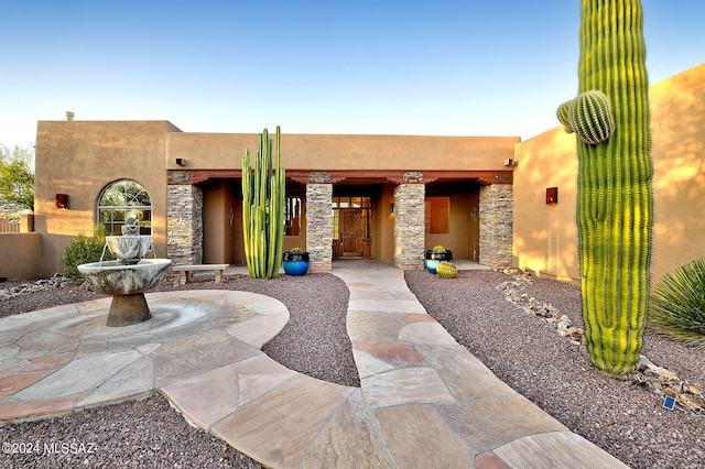 view of pueblo-style home