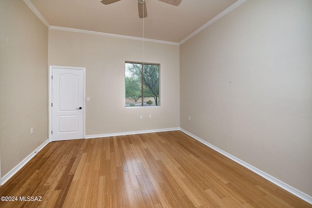 unfurnished room with ceiling fan, ornamental molding, and hardwood / wood-style flooring