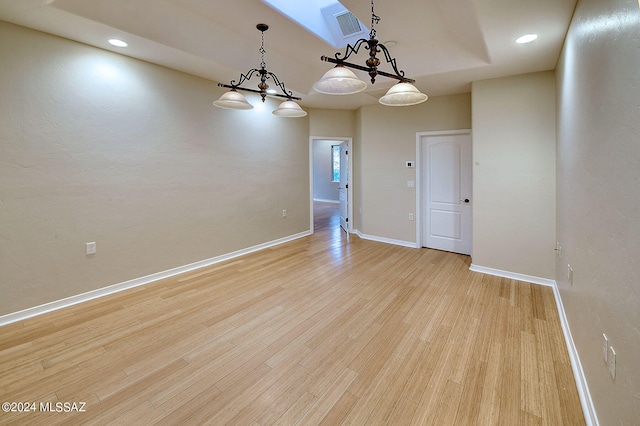 unfurnished dining area featuring light hardwood / wood-style floors