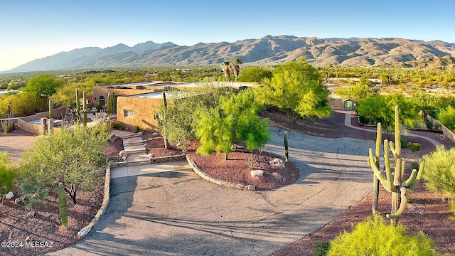 surrounding community featuring a mountain view