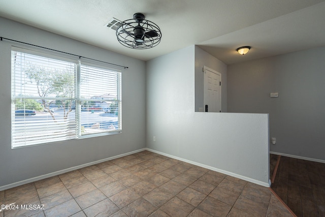 empty room with ceiling fan