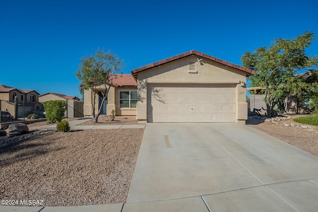 view of front of home featuring a garage