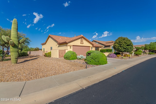 view of front of home with a garage