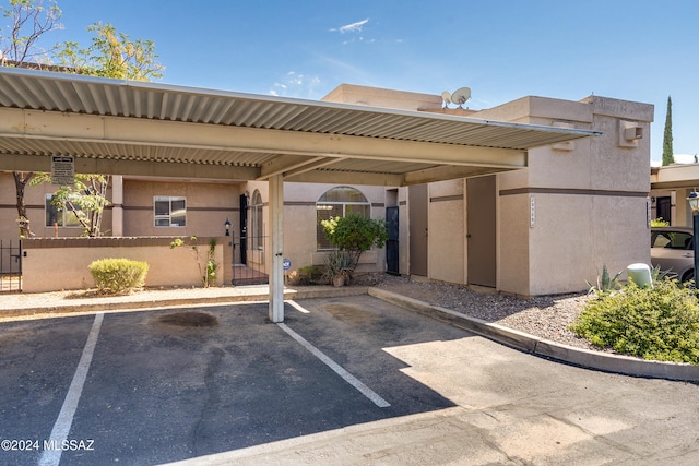 view of parking featuring a carport