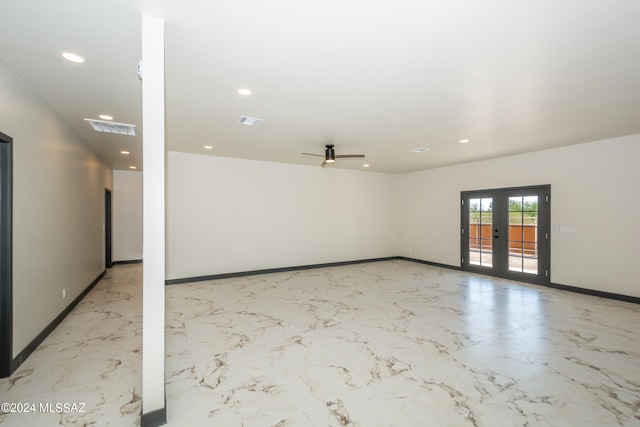 unfurnished room with french doors and ceiling fan