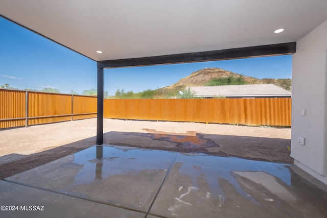 view of patio featuring a mountain view