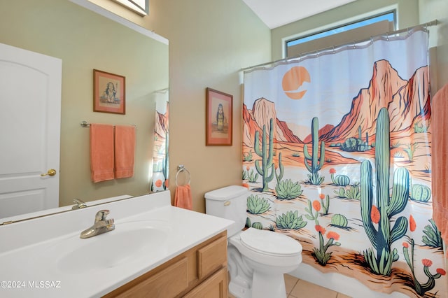 bathroom with curtained shower, toilet, vanity, and tile patterned floors