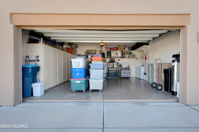 garage featuring washing machine and dryer