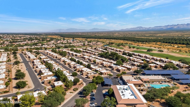 birds eye view of property featuring a mountain view and a residential view
