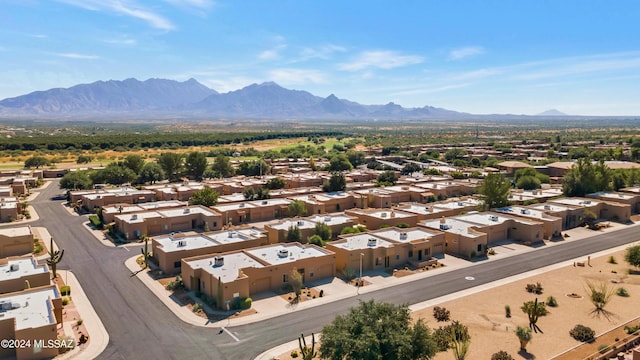 drone / aerial view featuring a mountain view and a residential view