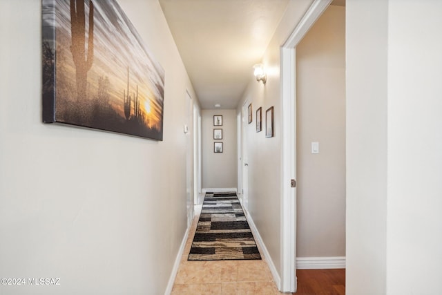 hallway featuring light tile patterned flooring