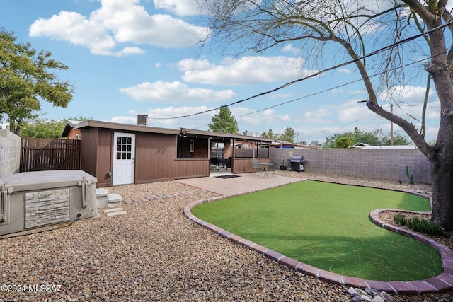 back of property featuring a patio area