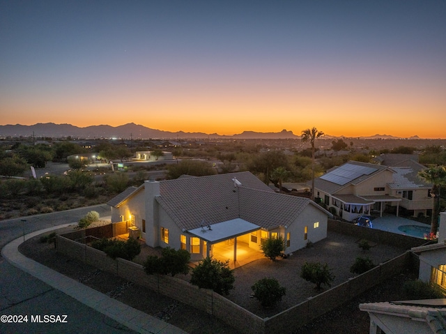 aerial view at dusk with a mountain view