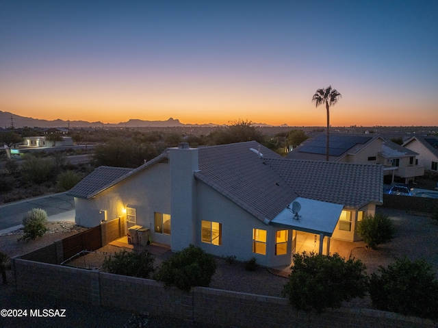 view of front of house featuring a mountain view