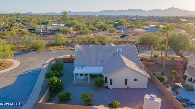 birds eye view of property featuring a mountain view