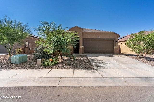 view of front of property featuring a garage