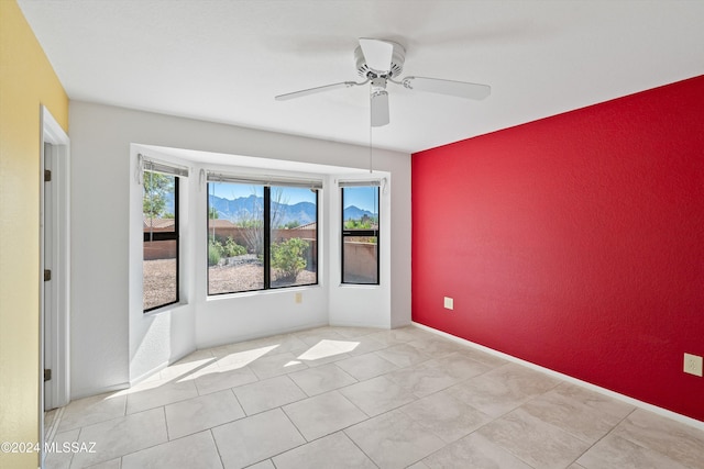 empty room with ceiling fan