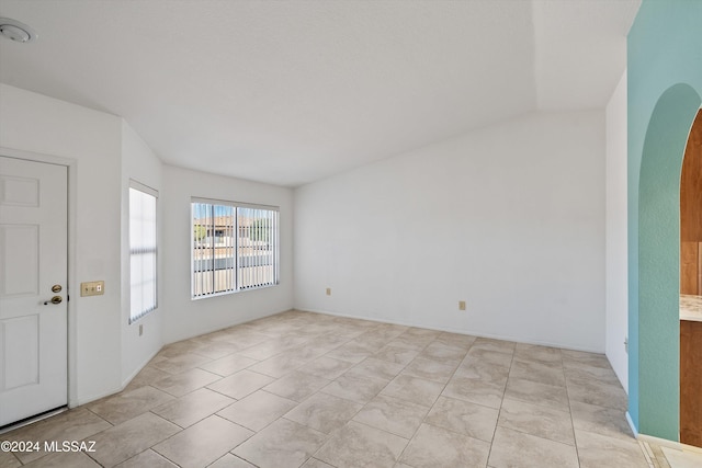 view of tiled spare room